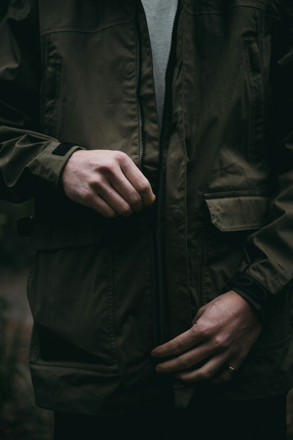 Field jacket detail with oxford shirt and chinos
