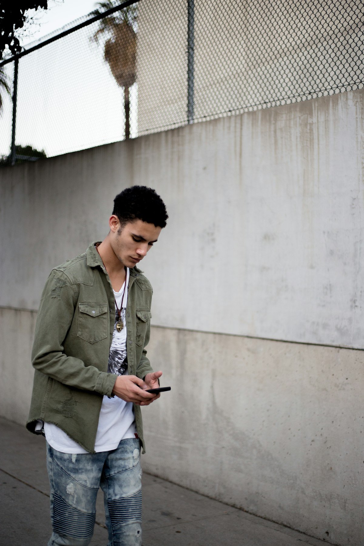 Field jacket with white tee and raw denim