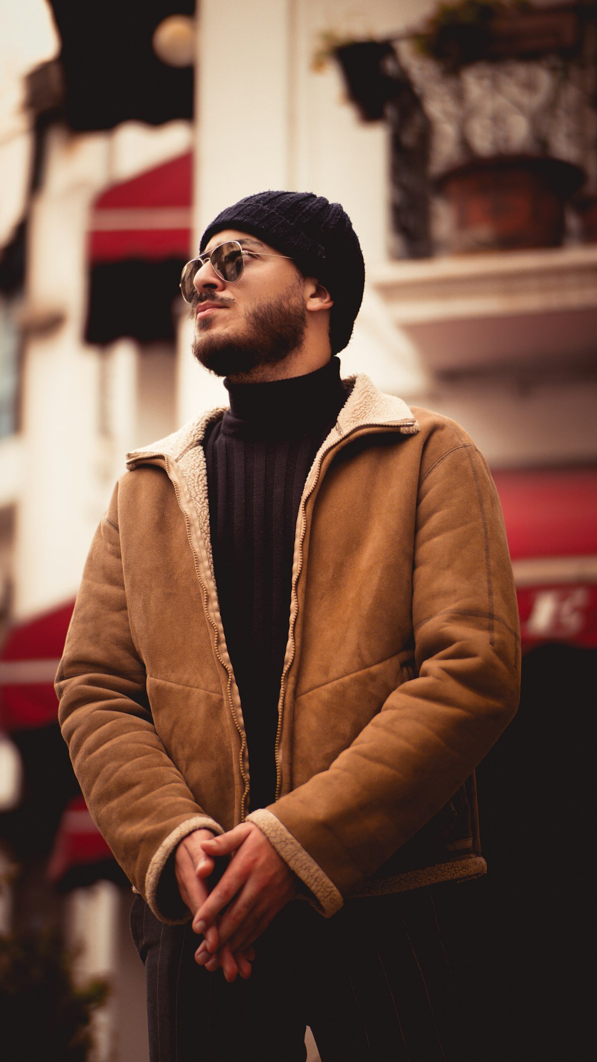 Field jacket layered over a turtleneck